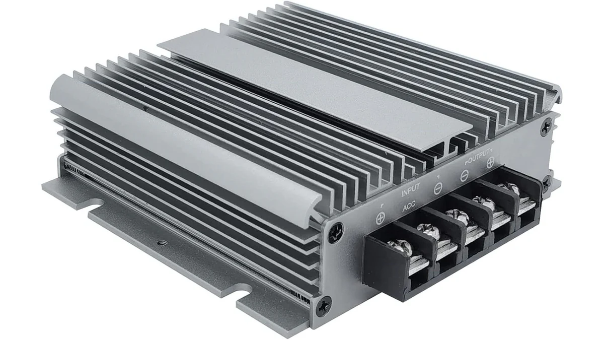 Electronic device with a finned aluminum heat-dissipation housing and terminal connections